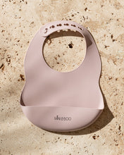 Load image into Gallery viewer, Mini and Boo silicone bib in dusty lilac – adjustable neck, deep food catcher pocket, BPA-free, dishwasher-safe toddler feeding accessory.